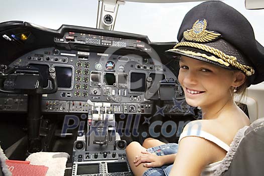 Girl sitting in the pilot seat Girl sitting in the pilot seat