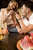 Couple having a glass of wine outside