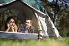 Couple looking through the tent door