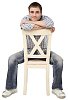 Isolated boy sitting on the chair