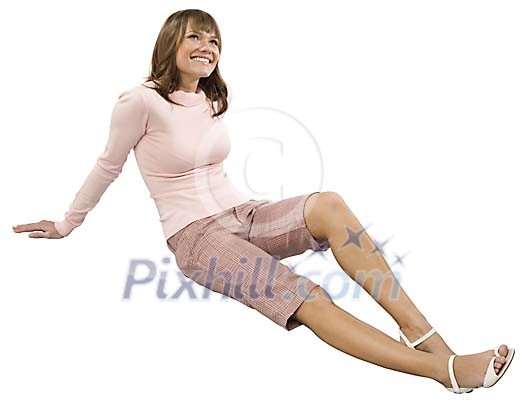 Isolated girl sitting on the floor Isolated girl sitting on the floor
