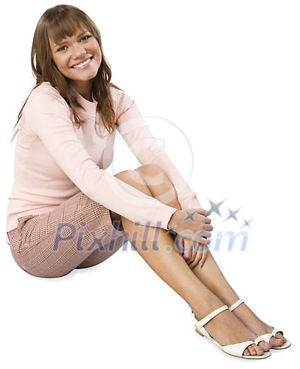 Isolated girl sitting on the floor