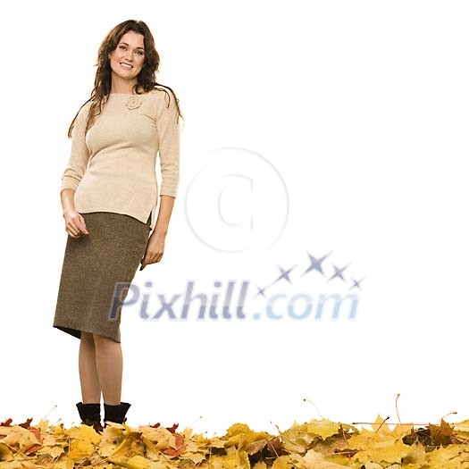 Woman standing on the autumn leaves Woman standing on the autumn leaves