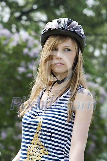 Girl with a cycling helmet Girl with a cycling helmet