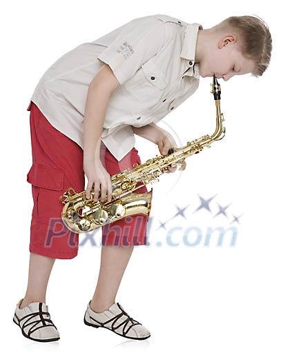 Isolated boy playing saxophone Isolated boy playing saxophone