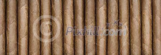 Background of row of cigars Background of row of cigars