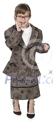 Isolated girl with a mobile, dressed in suit too big for her Isolated girl with a mobile, dressed in suit too big for her
