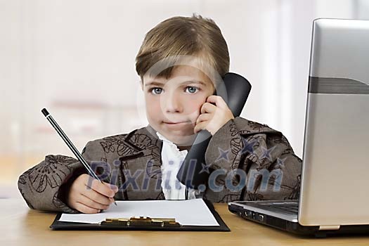 Small girl ackting like a businesswoman Small girl ackting like a businesswoman