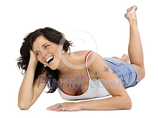 Woman laying on the floor, smiling Woman laying on the floor, smiling
