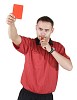 Isolated football referee showing a red card