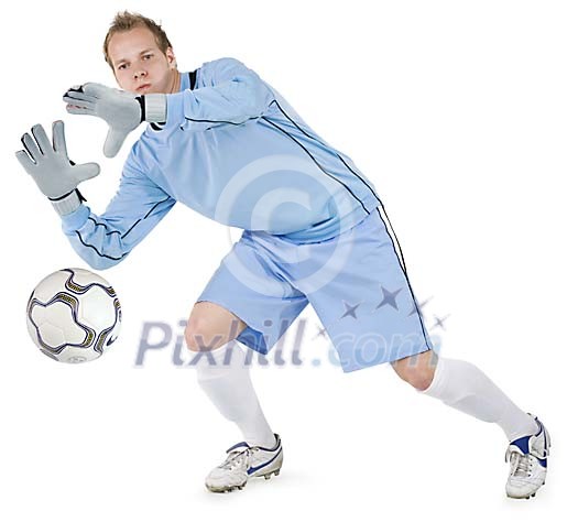Isolated footballer blocking ball Isolated footballer blocking ball