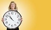 Woman covering her body with a big clock