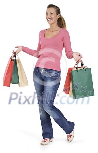 Isolated woman looking happy with her shopping bags Isolated woman looking happy with her shopping bags