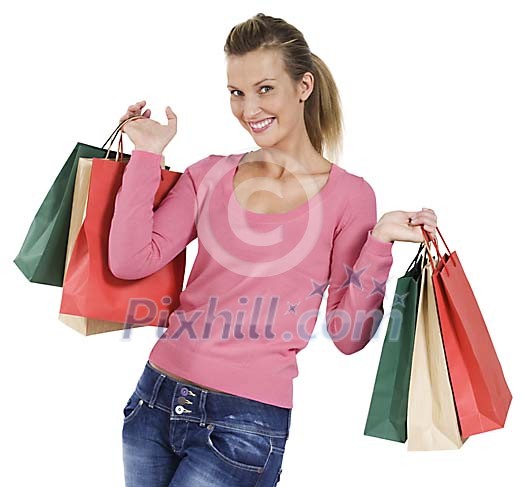 Isolated female looking happy with her shopping bags Isolated female looking happy with her shopping bags