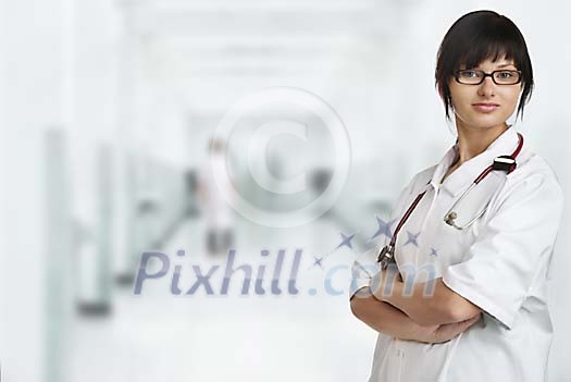 Female doctor standing in the hallway