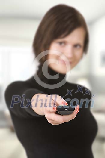 Female with a remote control Female with a remote control