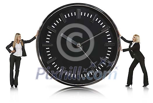 Two businesswomen holding a oversised clock Two businesswomen holding a oversised clock