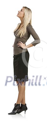 Isolated woman standing and looking up Isolated woman standing and looking up
