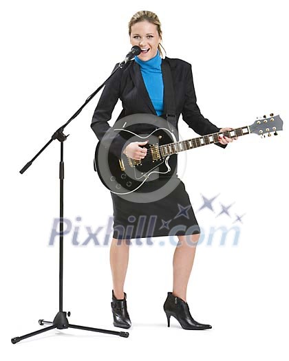 Isolated businesswoman playing a guitar and singing Isolated businesswoman playing a guitar and singing