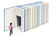 Isolated girl walking in to a house made of books