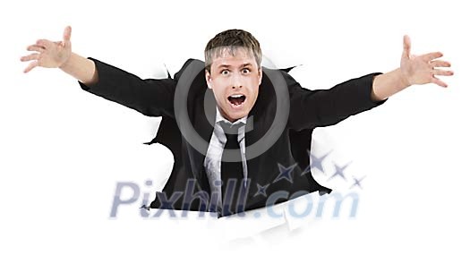 Business man breaking through a white wall Business man breaking through a white wall