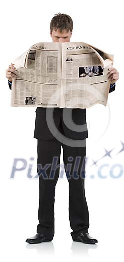 Isolated businessman reading newspaper Isolated businessman reading newspaper