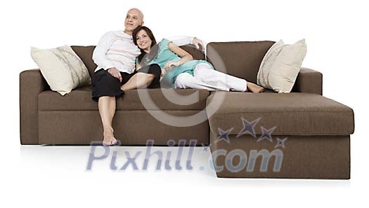 Isolated couple on the couch Isolated couple on the couch