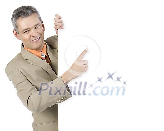 Businessman pointing his finger on a white poster Businessman pointing his finger on a white poster