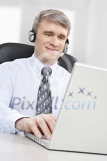 Businessman working at his desk Businessman working at his desk