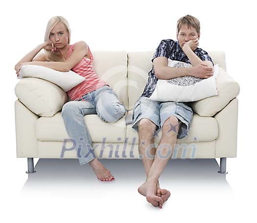 Isolated couple looking bored on the couch Isolated couple looking bored on the couch
