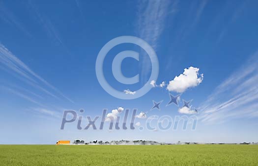 Truck speeding behind a green field