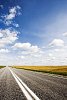 Empty asphalt road to distance 