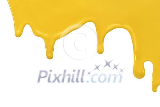 Dripping yellow paint with clipping path