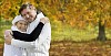 Senior couple hugging in autumn park