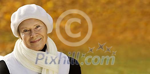 Senior lady enjoying a beautiful autumn day Senior lady enjoying a beautiful autumn day