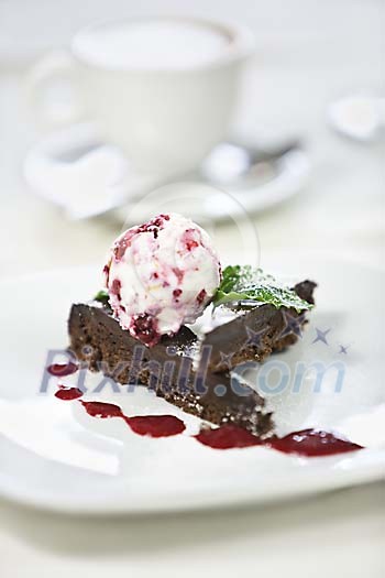 Chocolate cake and coffee on a restaurant table Chocolate cake and coffee on a restaurant table