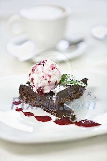 Chocolate cake and coffee on a restaurant table