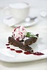 Chocolate cake and coffee on a restaurant table