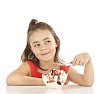 Young girl with ice cream bowl on white