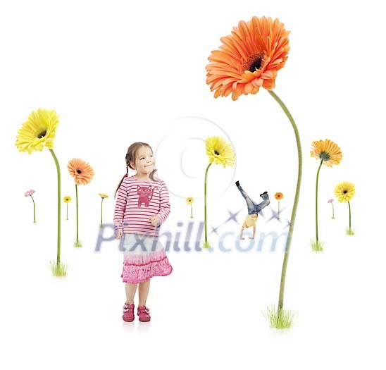 Small children playing in a fantasy flower forest Small children playing in a fantasy flower forest