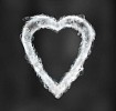 Smoke heart on black background