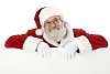 Clipped Santa leaning on a white sign