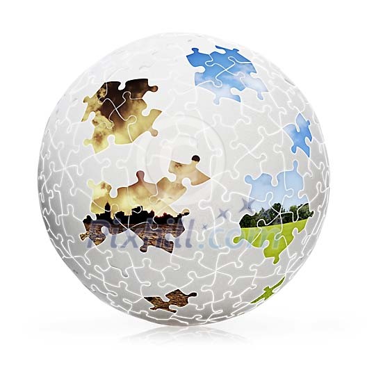 Conceptual globe puzzle revealing different environments Conceptual globe puzzle revealing different environments