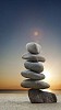 Stones balanced on the beach