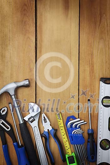 Tools on wooden floor Tools on wooden floor