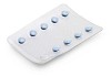 Clipped blue pills in package
