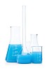 Clipped measuring glasses with blue fluid