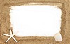 Sand shaped as a screen with seastar and a seashell