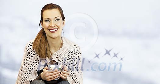 Woman sitting by the window Woman sitting by the window
