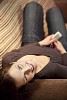 Woman on the couch looking up to the camera